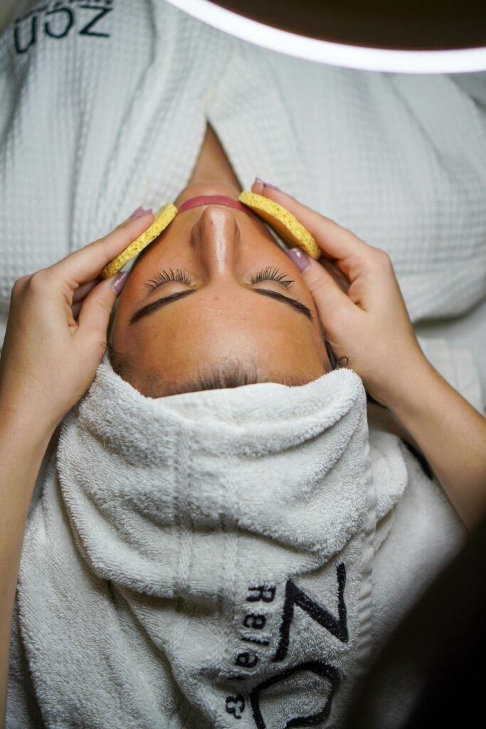 pexels-photo-3212164-3212164 Relaxing spa treatment with facial and sponge massage in a serene environment.